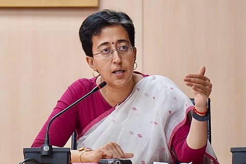 Atishi during a meeting